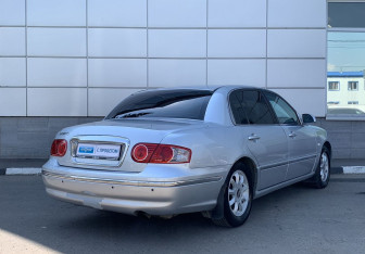 Подержанный автомобиль Kia Opirus 2003 года (5 фото)