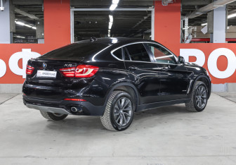Подержанный автомобиль BMW X6 2015 года (5 фото)