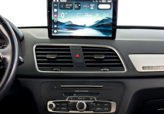 Подержанный автомобиль Audi Q3 2015 года (15 фото)