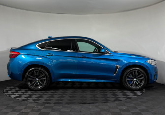 Подержанный автомобиль BMW X6 M 2016 года (6 фото)