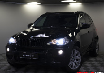 Подержанный автомобиль BMW X5 2009 года (25 фото)