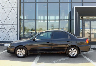 Подержанный автомобиль Kia Spectra Sedan 2006 года (8 фото)