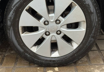 Подержанный автомобиль Kia Rio Sedan 2015 года (13 фото)