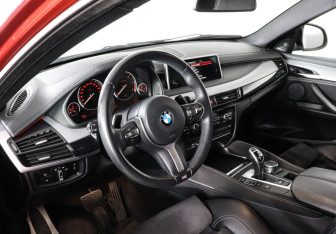 Подержанный автомобиль BMW X6 2016 года (11 фото)
