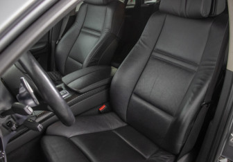 Подержанный автомобиль BMW X6 2013 года (12 фото)