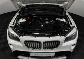 Подержанный автомобиль BMW X1 2011 года (10 фото)