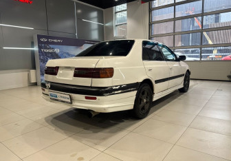 Подержанный автомобиль Toyota Corona Sedan 1998 года (4 фото)