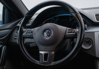 Подержанный автомобиль Volkswagen Passat CC 2014 года (15 фото)
