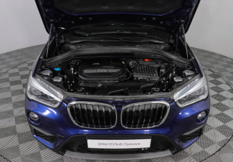 Подержанный автомобиль BMW X1 2018 года (10 фото)
