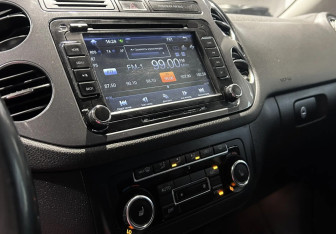 Подержанный автомобиль Volkswagen Tiguan 2013 года (11 фото)