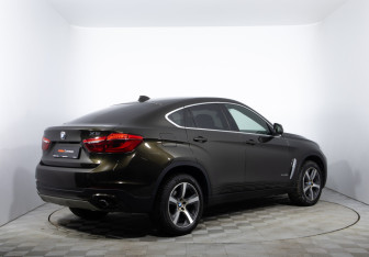 Подержанный автомобиль BMW X6 2015 года (5 фото)