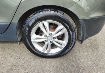Подержанный автомобиль Hyundai ix35 2010 года (11 фото)