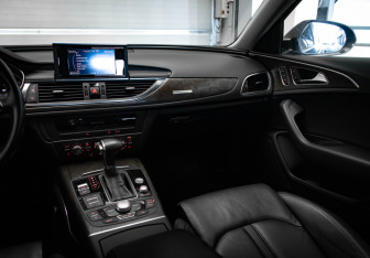 Подержанный автомобиль Audi A6 allroad 2012 года (22 фото)