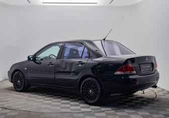 Подержанный автомобиль Mitsubishi Lancer Sedan 2006 года (3 фото)