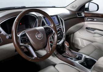 Подержанный автомобиль Cadillac SRX 2013 года (14 фото)