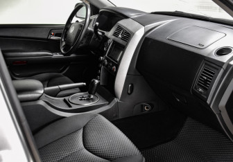 Подержанный автомобиль SsangYong Kyron 2014 года (10 фото)