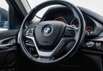 Подержанный автомобиль BMW X6 2015 года (15 фото)