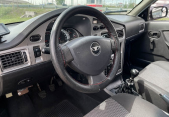 Подержанный автомобиль Daewoo Nexia Sedan 2013 года (13 фото)