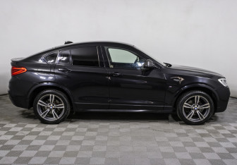 Подержанный автомобиль BMW X4 2015 года (4 фото)