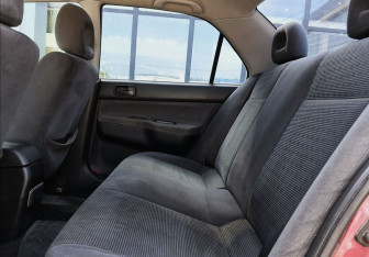 Подержанный автомобиль Mitsubishi Lancer Sedan 2005 года (18 фото)