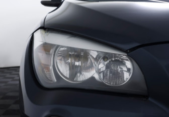 Подержанный автомобиль BMW X1 2014 года (19 фото)