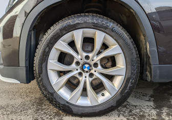 Подержанный автомобиль BMW X1 2014 года (12 фото)