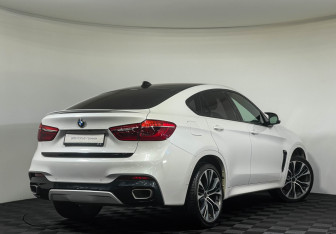 Подержанный автомобиль BMW X6 2016 года (2 фото)
