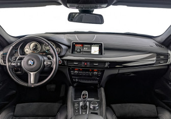 Подержанный автомобиль BMW X6 2018 года (14 фото)