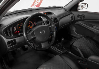 Подержанный автомобиль Nissan Almera Classic 2007 года (6 фото)