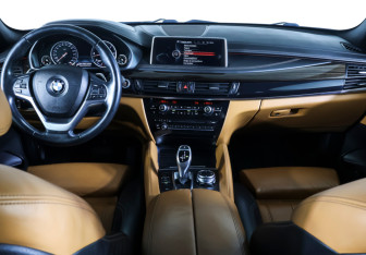 Подержанный автомобиль BMW X6 2014 года (12 фото)