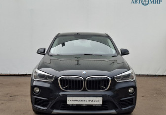 Подержанный автомобиль BMW X1 2015 года (2 фото)