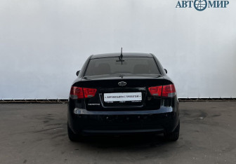 Подержанный автомобиль Kia Cerato Sedan 2012 года (6 фото)