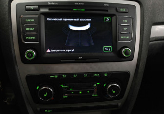 Подержанный автомобиль Skoda Octavia Liftback 2013 года (16 фото)