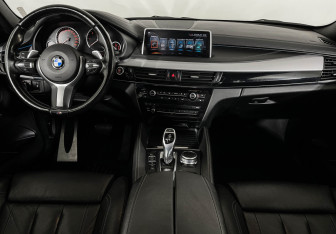 Подержанный автомобиль BMW X6 2017 года (12 фото)