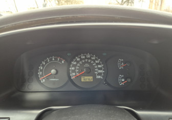 Подержанный автомобиль Kia Spectra Sedan 2006 года (10 фото)