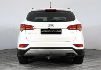 Подержанный автомобиль Hyundai Santa Fe 2016 года (4 фото)