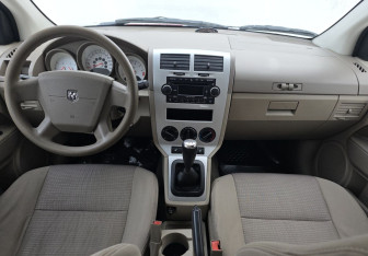 Подержанный автомобиль Dodge Caliber 2007 года (11 фото)