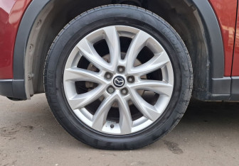 Подержанный автомобиль Mazda CX-5 2011 года (9 фото)