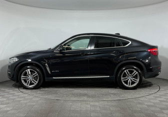 Подержанный автомобиль BMW X6 2015 года (5 фото)