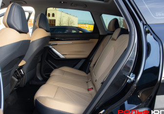 Подержанный автомобиль Geely Atlas 2024 года (8 фото)