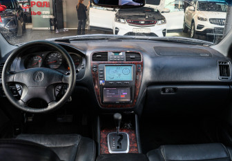 Подержанный автомобиль Acura MDX 2002 года (12 фото)