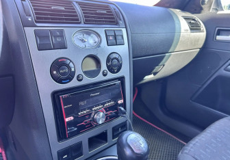 Подержанный автомобиль Ford Mondeo Liftback 2001 года (13 фото)