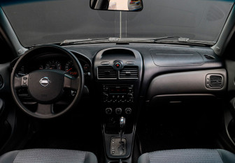 Подержанный автомобиль Nissan Almera Classic 2011 года (9 фото)