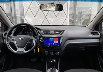 Подержанный автомобиль Kia Rio Sedan 2015 года (11 фото)