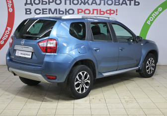 Подержанный автомобиль Nissan Terrano 2015 года (4 фото)