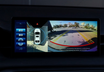 Подержанный автомобиль Kaiyi E5 2023 года (14 фото)