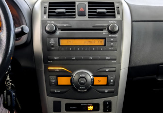 Подержанный автомобиль Toyota Corolla Sedan 2008 года (15 фото)