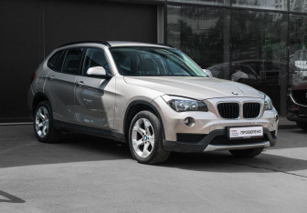 Подержанный автомобиль BMW X1 2014 года (3 фото)