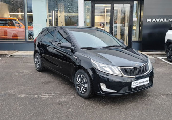 Подержанный автомобиль Kia Rio Hatchback 2014 года (3 фото)