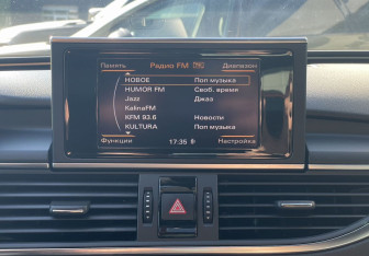 Подержанный автомобиль Audi A7 2011 года (15 фото)